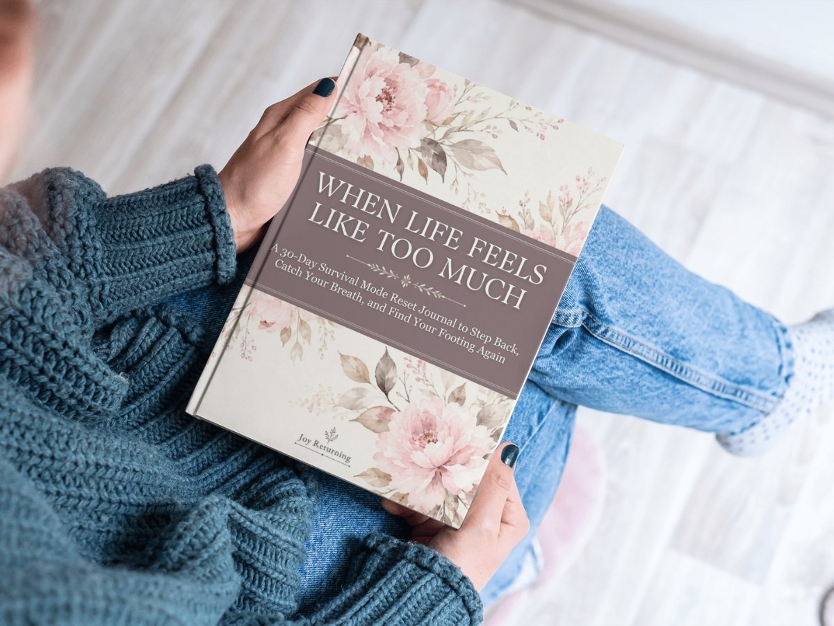 woman holding When Life Feels Like Too Much journal